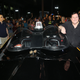 Burt Ward, who played Robin opposite West, with a Batmobile.